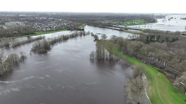 High water level in the river Vecht near Zwolle in Overijssel. The river is overflowing on the floodplains after heavy rainfalll upstream.