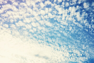 High clouds in the summer sky. Sky background. Meteorological observations of the sky.