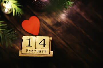 Feb 14 Happy Valentine's Day. February 14 calendar date text on wooden blocks with customizable space for text or ideas. Copy space and calendar concept.