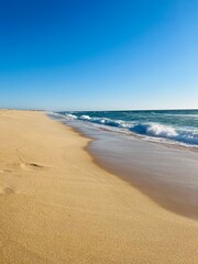 Sand beach, sea coastline, pure blue sky, natural seascape background, no people