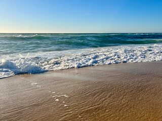 Sand beach, sea coastline, pure blue sky, natural seascape background, no people
