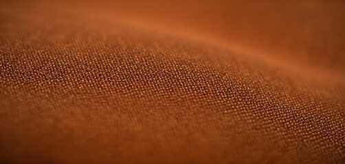  a close up of a brown cloth with a small amount of light coming from the top of the fabric and a small amount of light coming from the bottom of the fabric to the bottom of the fabric.
