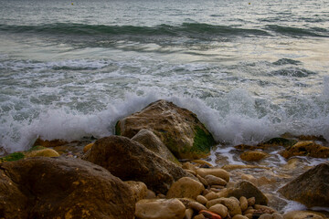 Mediterranean sea waves. Waves crashing on rocks