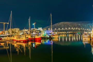 Foto op Canvas View of a marina and harbor in Tromso at night, North Norway. Tromso is considered the northernmost city in the world with a population above 50,000 © johnkruger1