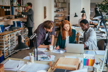Multiracial team working together in a creative office