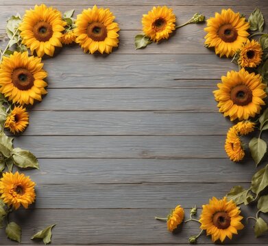 Frame of sunflowers on wooden background. Top view with copy space