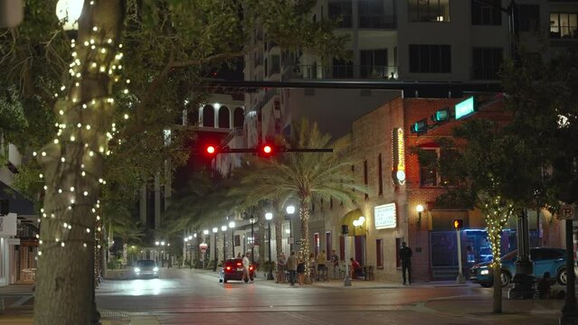 Main Street intersection in Sarasota, Florida. Historic downtown district with walkable city center at night