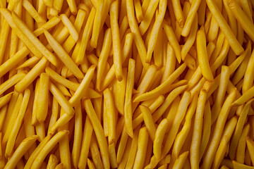 Crispy Golden Tangle: A Lively Jumble of Freshly Cooked French Fries
