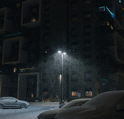 Snow falling under the street light in winter