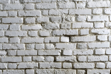 Fototapeta premium White brick wall textured background, front view
