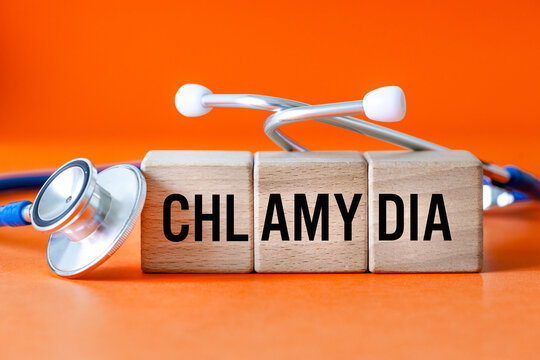 Chlamydia (Chlamydia Trachomatis) Health concept, Bacteria causing urinary tract infection, Sexually transmitted disease, doctor's stethoscope and word Chlamydia written on wooden blocks