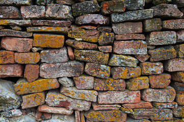 Close-up of old red brick wall texture background.