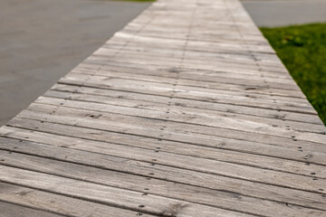 a path made of wooden panels