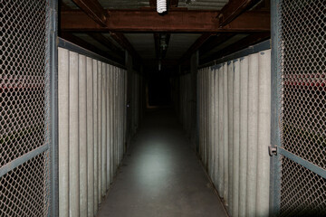 Dark conduit corridor of industrial cable overpass. Busbar gallery.