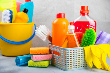 Cleaning service concept.Home cleaning product on a light background. Bucket with household...