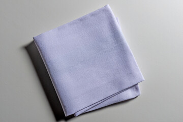 Top view of folded light blue napkin