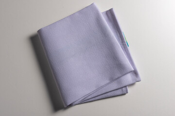 Top view of folded light blue napkin