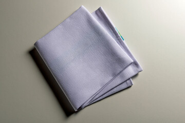Top view of folded light blue napkin