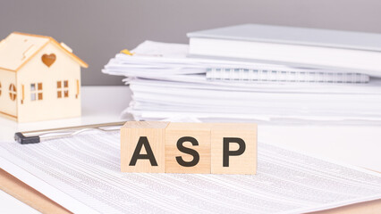 ASP - business and technology concept. text on wooden cubes