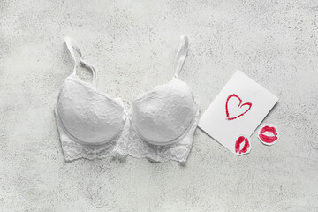 Sexy underwear with love letter and paper kisses on grunge white background. Valentine's Day...