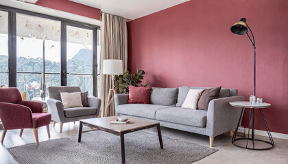 Stylish grey sofa and armchairs against pink and crimson wall with copy space. Minimalist japandi home interior design of modern living room.