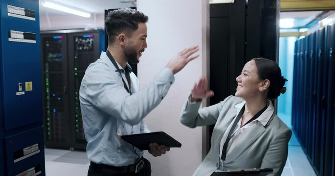 People, teamwork and server room, for cloud computing, digital solution and cybersecurity success with high five. Engineering man and woman with tablet, checklist and happy celebration in data center