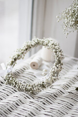 Obraz premium Bridal flower crown. White gypsophila wedding accessories. Bridal flowers in white colors