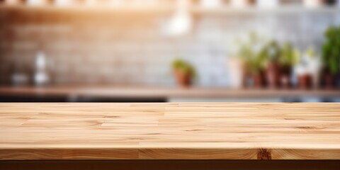 Wooden table top can be utilized for showcasing or assembling products in a blurred kitchen setting.