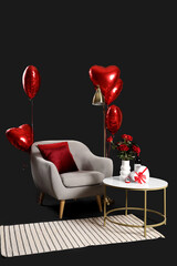Armchair with table, lamp and decor for Valentine's Day on dark background