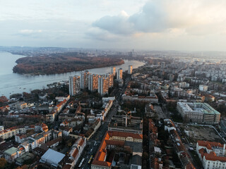 Fototapeta premium Drone flight at sunset above the Zemum district, Belgrade, Serbia, Europe