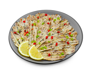 Tasty pickled anchovies with spices and lemon isolated on white