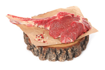 Raw ribeye steak and spices isolated on white