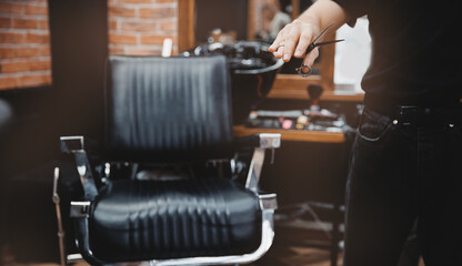 Modern hairdresser salon for man, retro toning. Barbershop banner, barber hold scissors on...