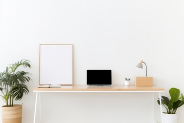 Desk With Laptop and Potted Plant - Organized Workspace for Productivity and Greenery