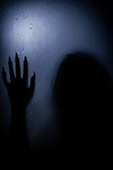 person in the darkness