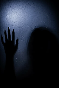 person in the darkness