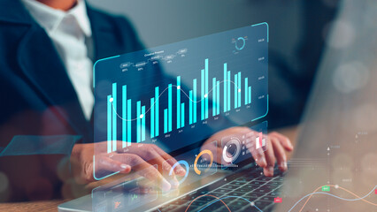 Data analyst working on business analytics dashboard with charts, metrics, and KPI to analyze...