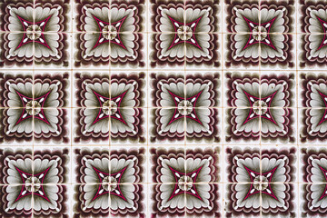 Ceramic square  tiles with small ornamental mosaic pieces. Old tiles abstract pattern