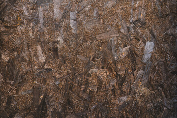 Grunge old wooden sawdust background, texture. Wooden surface in brown color, abstract