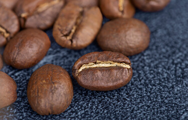 background of fresh roasted coffee beans, top view