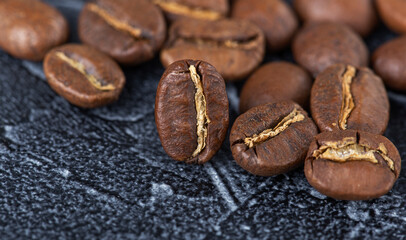 background of fresh roasted coffee beans, top view