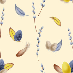 Seamless pattern. Easter theme in watercolor. Willow brunches, feathers, eggs on a pale yellow background.Good for textile, kitchen prints, towels, scrapbooking.