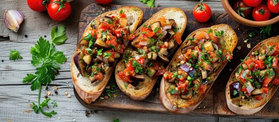 Healthy vegetarian appetizer: Toasted bread with eggplant caviar or antipasti. - obrazy, fototapety, plakaty