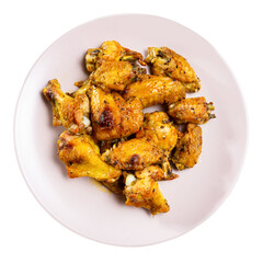 Delicious fried chicken wings served on platter. Isolated over white background