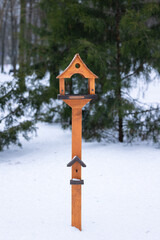 Bird house in the snow