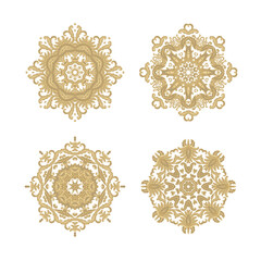 Set of stylized ornamental floral rosettes, mandala,  calligraphic adornments, on white background  