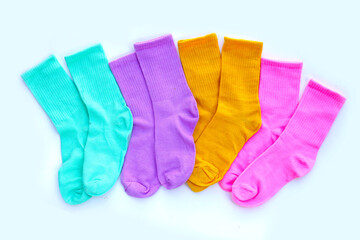 Colorful socks on white background.