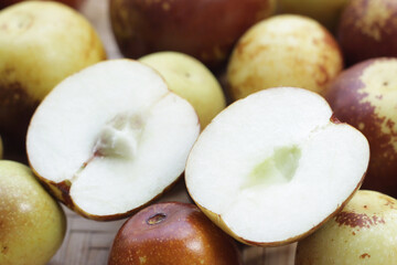 Fresh jujube fruit in bamboo weave plate