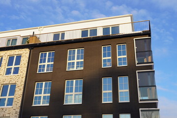 Close up of new modern building in Noblessner district. Blue sky on the back. Tallinn, Estonia, Europe. January 2024.