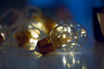 Obraz na płótnie Canvas Bright light bulb lamps shining on close up still